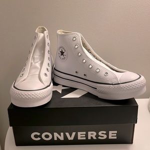 Kids brand new never worn platform, high top converse